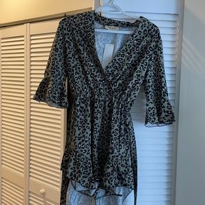 NEVER WORN quarter sleeve cheetah print romper with tie!
